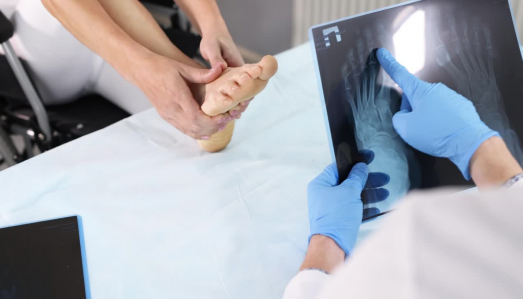 doctor examining foot xray